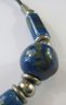 Contemporary CORD Necklace, FLORAL Patterned Blue Beads, Base Metal Clip Closure