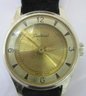 Signed SENTINEL, Vintage Wristwatch, Lightweight Gold Tone Aluminum Case, Black Band, Swiss Made
