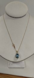 10kt Gold W/blue Topaz And Diamond Chip Pendant W/14kt Gold Chain