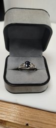 .925 Sterling Silver And Dark Blue Sapphire (?) Ring Size 8