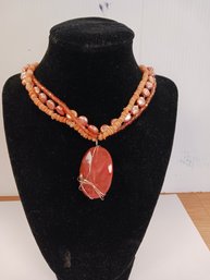 Peach Triple Strand W/large Stone Necklace