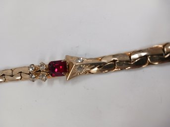 Goldtone Herringbone Ruby Red Snake Bracelet