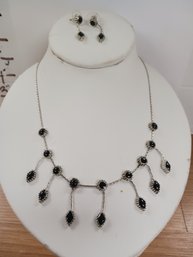 Silvertone And Black Necklace And Earrings
