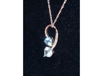Sterling Silver And Lite Blue Topaz Necklace