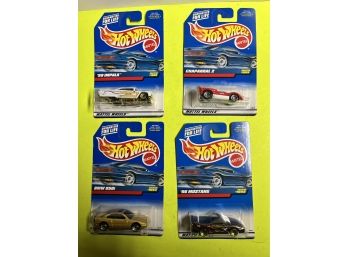 4 Hot Wheels - New In Package. M2