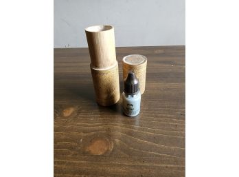 Hemp Oil In Wooden Cylinder
