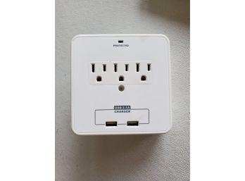 Plug In Outlet With USB Ports And Fold Down Shelves For Phones/ Devices When Charging