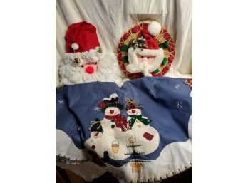 2 Santa Door Hangers And Tree Skirt