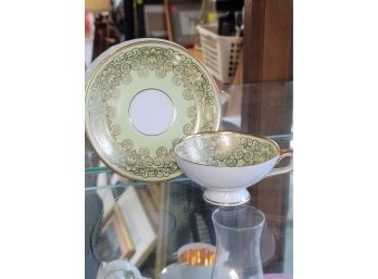 Green And Gold Cup And Saucer
