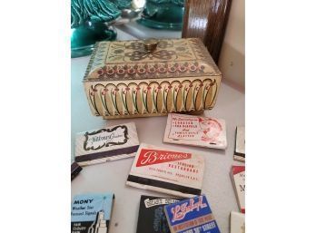 West German Tin And Matchbooks