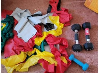 Large Collection Of Exercise Bands With Dumbbells