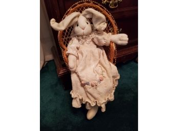 Stuffed Rabbit In Wicker Chair