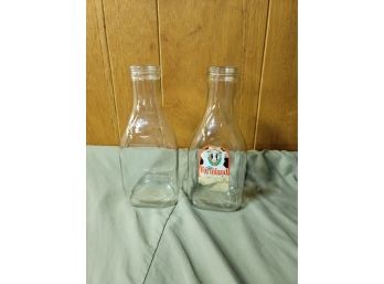 Two Farmland Milk Bottles