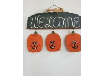 Welcome Sign With Decorations For All 12 Months.