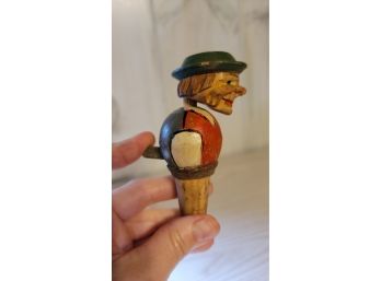Wooden Bottle Stopper Lifts His Head Up