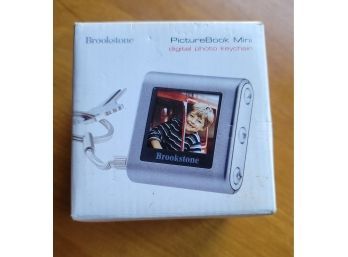 Brookstone Picture Book Mini Keychain
