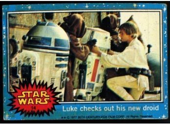 1977 Topps Star Wars Luke Checks Out His New Droid #14