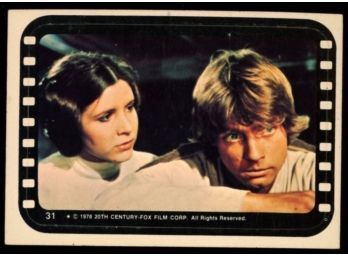 1977 Topps Star Wars Sticker Princess Leia Comforts Luke #31