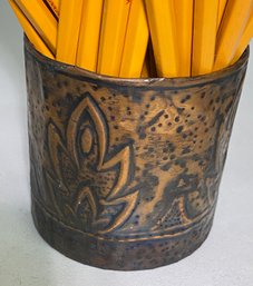 Old Tin Can Covered With Copper And Decorated