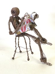 Sculpted With Scrap Wire This Reading Man Enjoys A Schaefer Beer Read