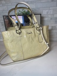 COACH C-Logo Patent Leather Purse.  Pastel Yellow Embossed.