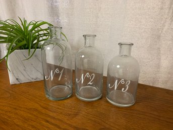 Set Of Three Numbered Glass Bottles