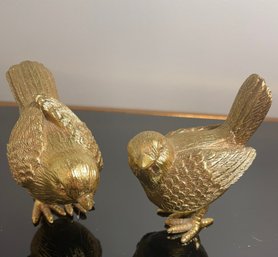 A Pair Of Small Gold Feathered Friends