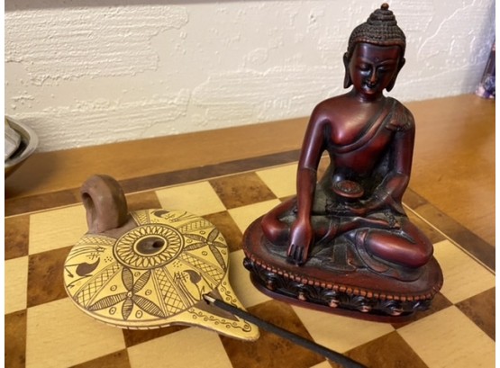 Sitting Buddha And Incense Burner