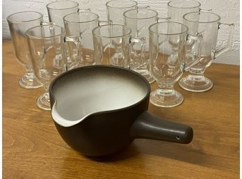 Ten Mugs And A Ceramic Pouring Pot