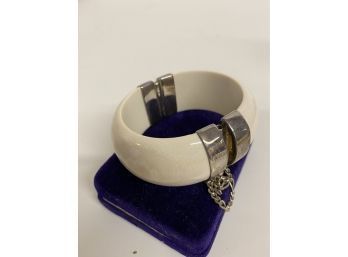 Hinged Smooth Ivory Colored Bracelet With Silver Bands