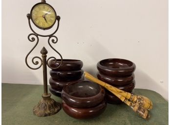 Eight Wooden Salad Bowls And A Standing Clock