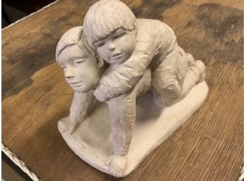 Sculpture Of Two Young Boys