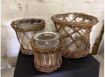 Three Glass And Wicker Candle Holders