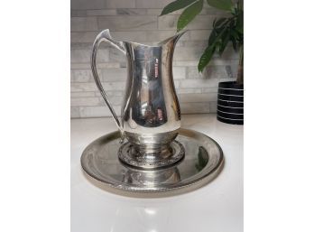 Silver Plate Platters And Pitcher