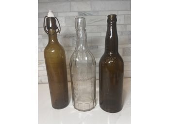 Vintage Bottles, Leisy, Wired With Porcelain Stopper  And Hayner Distilling Company.