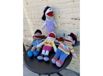 Four Hand Puppets And A Skateboard