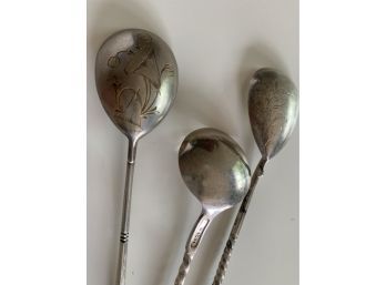 Three Ornate Silver Spoons