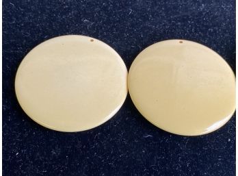 Two Large 2.25 Inch Bakelite Disks