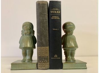 Cute Pair Of Metal Boy & Girl Standing On Book Bookends