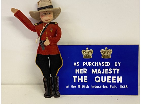 1938 Sign From The British Museum And Old Felt Mountie Doll