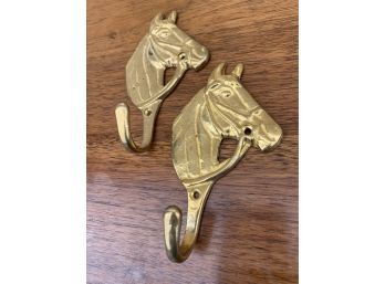 Two Brass Horse Hooks