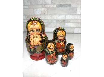 Hand Painted Russian Nesting Doll Set.  9 Piece