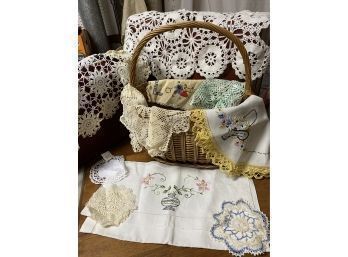 Basket Of Vintage Linens And Doilies