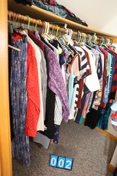 LOT 2 - INCREDIBLE COLLECTION OF WOMENS CLOTHING! (INFO ON POST IT NOTES) LEFT SIDE OF CLOSET
