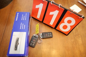 LOT 118 - NEWER VOLVO KEY FOBS AND OTHER ITEM.  RESELL ON EBAY FOR HUNDREDS!!!