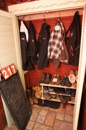 LOT 217 - ITEMS INSIDE KITCHEN CLOSET - MOSTLY CLOTHING AND SHOES