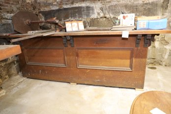 LOT 225 - MASSIVE ANTIQUE BAR WITH ITEMS ON IT AND IN IT - BRING HELP TO TAKE OUT BULKHEAD