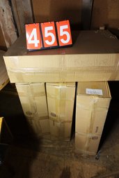 LOT 455 - UNKNOWN HEAVY ITEMS INSIDE SEVERAL BOXES - BRING HELP THEY ARE HEAVY! - ABOVE BARN