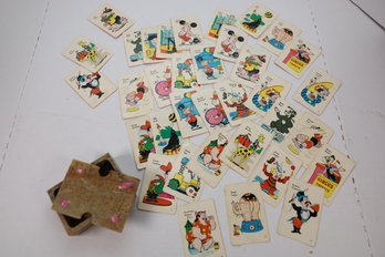LOT 109 - VINTAGE 'RACY' PLAYING CARDS AND STONE CARD HOLDER