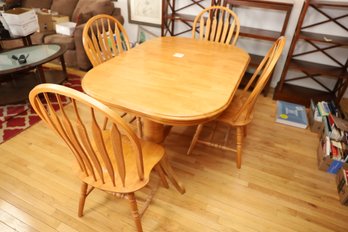 LOT 124 - SOLID WOOD TABLE AND 4 CHAIRS